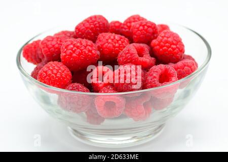 Glass bowl of Ripe Raspberries Stock Photo