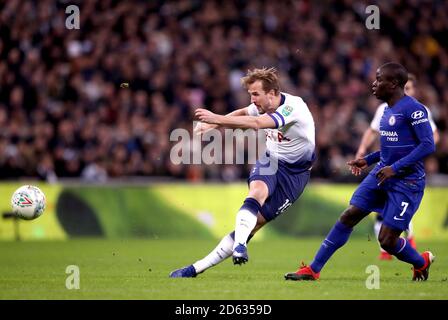 Tottenham Hotspur's Harry Kane (left) takes a shot Stock Photo