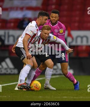 Sheffield United's Mark Duffy battles with Queens Park Rangers' Jordan Cousins Stock Photo