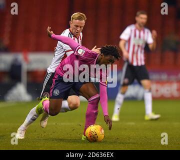 Sheffield United's Mark Duffy battles with Queens Park Rangers' Eberechi Eze Stock Photo