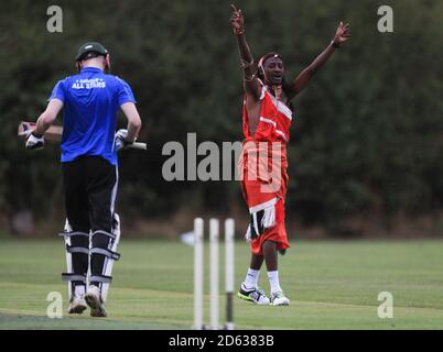 Maasai Warriors' cricket team play against Notts & Arnold Amateur CC's during their UK tour to raise awareness of gender inequality, the End FGM Campaign, hate crime, modern slavery, conservation and promoting their culture and country, Kenya Stock Photo