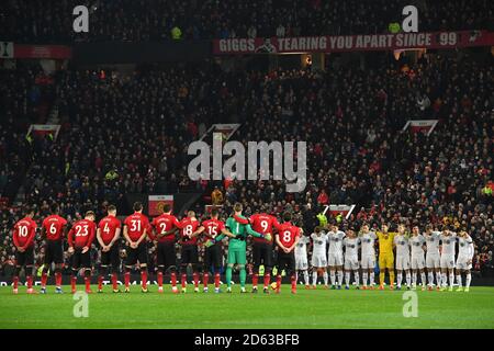 The teams observe a minutes silence  Stock Photo