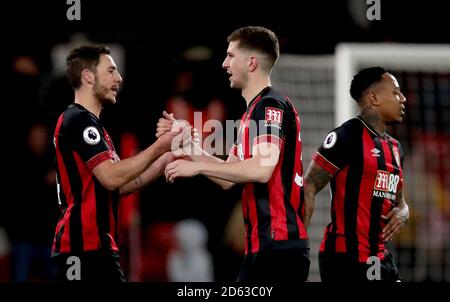 AFC Bournemouth's Charlie Daniels (left) and Chris Mepham (centre) celebrate after the final whistle Stock Photo