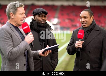 BT Sport pundits Paul Ince (right), Andy Cole (centre) and presenter Matt Smith (left) before the FA Cup fifth round match at Ashton Gate, Bristol.  Stock Photo