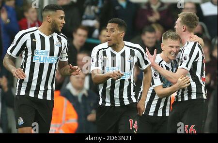 Newcastle United's Sean Longstaff (right) celebrates with team mates after scoring his side's second goal of the game Stock Photo