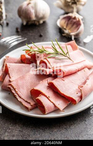 Sliced beef ham on plate. Stock Photo