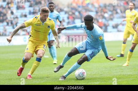 Coventry City's Jordy Hiwula and Bristol Rovers'  James Clarke Stock Photo