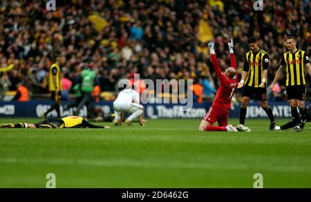 Watford goalkeeper Heurelho Gomes celebrates at full time  Stock Photo