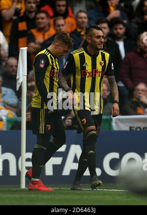 Watford's Gerard Deulofeu (left) celebrates scoring his side's third goal of the game with teammates Stock Photo