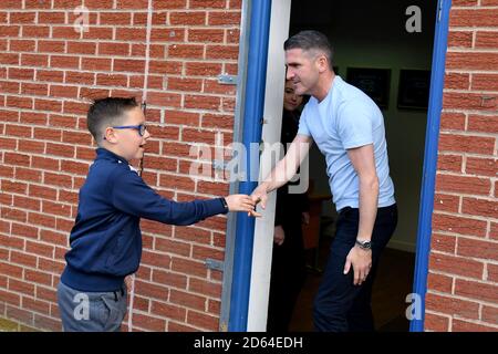 Bury's manager Ryan Lowe meets fans prior to kick-off Stock Photo