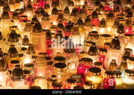 A texture of endless grave lantern lights glowing in red, yellow, orange and green colors Stock Photo