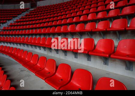 A general view of empty seats in the stadium ahead of kick-off Stock Photo