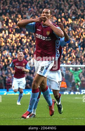 Aston Villa's John Carew celebrates scoring the opening goal Stock Photo