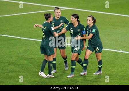 Australia's Sam Kerr (centre) celebrates scoring her side's fourth goal of the game with team-mates Stock Photo