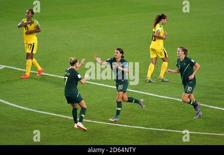 Australia's Sam Kerr (centre) celebrates scoring her side's fourth goal of the game with team-mates Stock Photo
