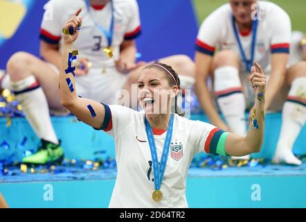 USA's Alex Morgan celebrates after the game. Stock Photo