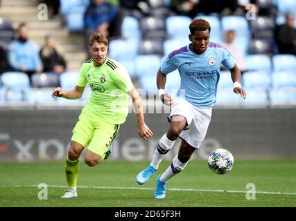 Manchester City's Jayden Braaf (right) and Dinamo Zagreb's Roko Jurisic battle for the ball Stock Photo