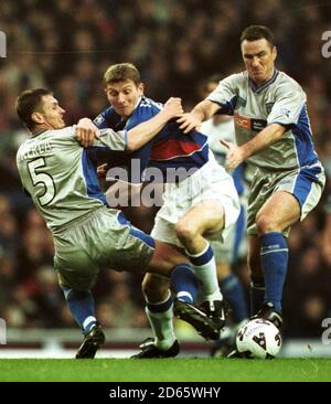 Rangers Tore Andre Flo (right) takes the ball around Celtic's Stephane ...
