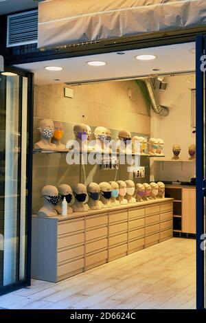 Interior of a store selling facemasks, Calle Fuencarral, Madrid, Spain, September 2020 Stock Photo