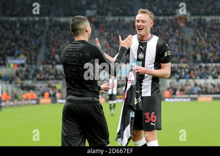 Newcastle United's Miguel Almiron celebrates his goal with team-mate Sean Longstaff Stock Photo