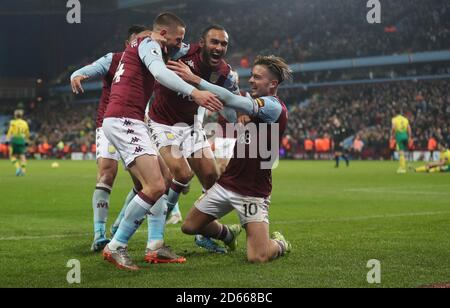 Aston Villa's Conor Hourihane (left) celebrates scoring the first goal Stock Photo