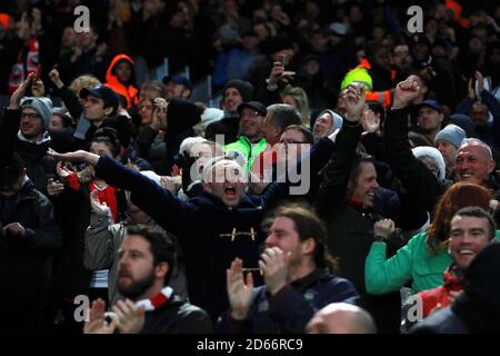 Barnsley supporters celebrate after Barnsley's Cauley Woodrow (not pictured) scores his side's third goal of the game Stock Photo