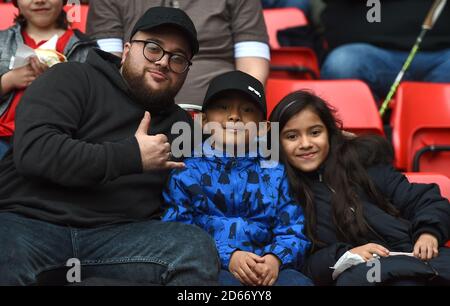 Cartlon Athletic fans in the stands Stock Photo