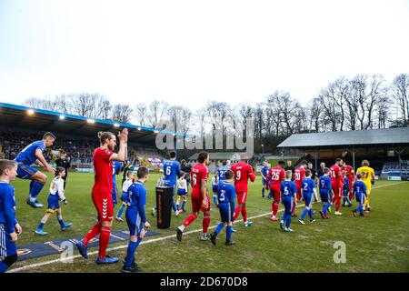 FC Halifax Town and Ebbsfleet players enter the pitch during the  Vanarama Conference Premier League  match at The Shay Stock Photo