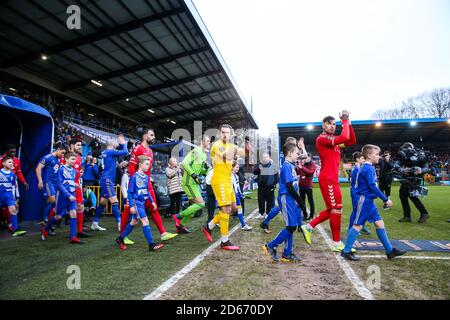 FC Halifax Town and Ebbsfleet players enter the pitch during the  Vanarama Conference Premier League  match at The Shay Stock Photo