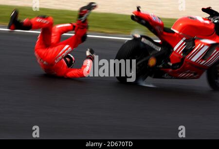 Ducati Marlboro's Casey Stoner (AUS) crashes during free practice Stock Photo
