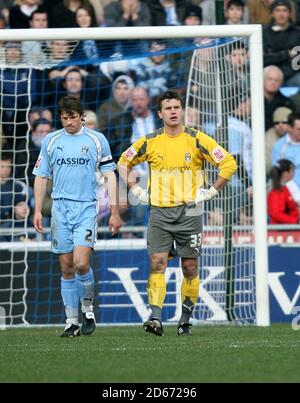 Coventry City goalkeeper Andy Marshall and Arjan De Zeeuw (left) stand dejected after West Bromwich Albion's Roman Bednar scores his sides second goal of the game  Stock Photo