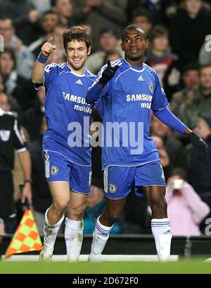 Chelsea's Joe Cole (l) celebrates scoring his sides fourth goal with teammate Salomon Kalou Stock Photo