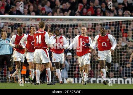 Arsenal's Fredrik Ljungberg (2nd from r) celebrates scoring his second and Arsenal's third goal against  Middlesbrough Stock Photo