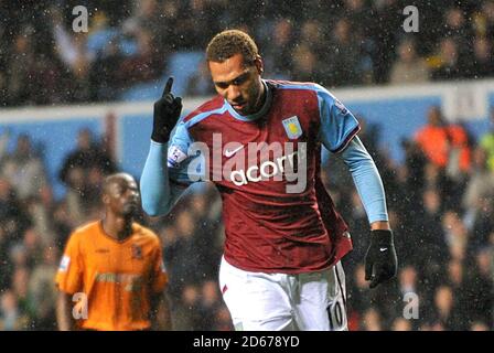 Aston Villa's John Carew celebrates scoring his sides third goal of the game, from the penalty spot Stock Photo