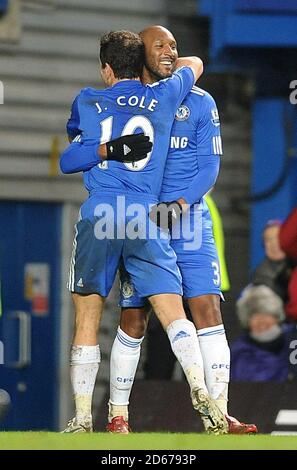 Chelsea's Nicolas Anelka (right) celebrates scoring his sides sixth goal with teammate Joe Cole (left) Stock Photo
