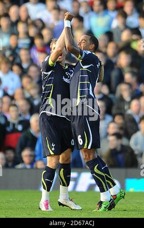 Tottenham Hotspur's Tom Huddlestone (right) celebrates scoring the winning goal with team-mate Roman Pavlyuchenko Stock Photo