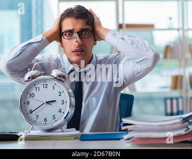 The businessman suffering from excessive armpit sweating Stock Photo