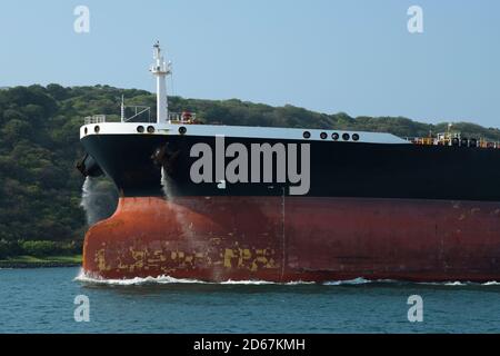 Transport, bow of cargo ship leaving harbour, motion, Durban, South Africa, commercial shipping, abstract, backgrounds, illustration, conceptual Stock Photo