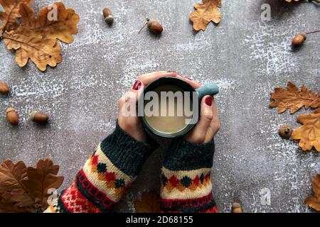 Autumn composition. Frame made of Pumpkins,dried leaves, pine cones and tes cup background. Template autumn, fall, halloween, harvest thanksgiving Stock Photo