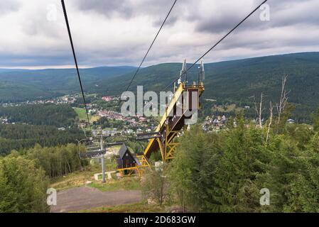 Aerial view of Harrachov town with decaying ski jump tower and chair lift in Czech Karkonosze mountains Stock Photo