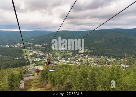 Aerial view of Harrachov town with decaying ski jump tower and chair lift in Czech Karkonosze mountains Stock Photo