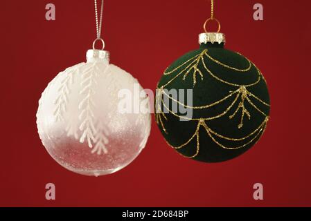 Christmas Baubles on a red background Stock Photo