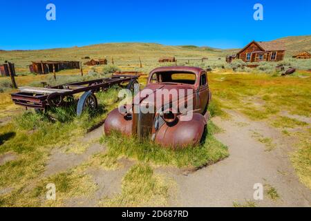 Rusty wreck of the vintage old car, in Bodie state historic park, Californian Ghost Town. The United States of America. Stock Photo