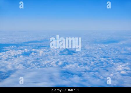 background, cloudscape - continuous cumulus clouds, top view, from an airplane or from space Stock Photo