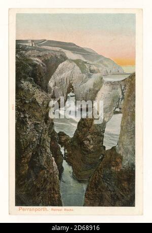 Early 1900's tinted postcard of Perranporth Retreat Rocks, showing natural arches,  posted August 1908 from Perranporth, Cornwall, England, U.K. Stock Photo