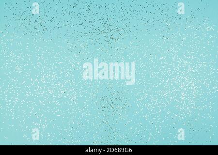 Blue Festive background texture with glittering confetti. Stock Photo