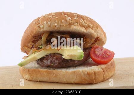 burger with gorgonzola, onion tomato cherry and avocado Stock Photo