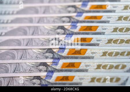 Got profit from business with beautiful background and texture of one 100 dollars, money, hundred dollar bills, close-up. Stock Photo