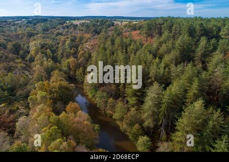 Small valley “Vallon de la chambre aux loups” in Iffendic (Brittany, north-western France). Aerial view of the small valley and the stream of Boutaven Stock Photo