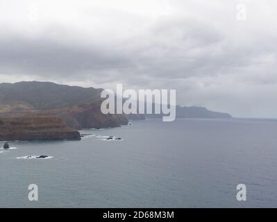 Hike trail on Ponta De Sao Lourenco on the coast of Madeira looking out to sea and back to the mountains Stock Photo